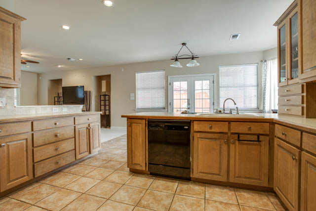 The kitchen is complete with gorgeous cabinets and plenty of counter space.