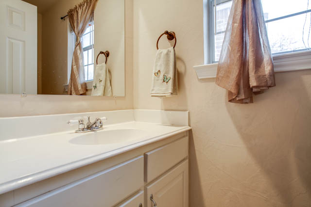 One half bath is featured in the home.