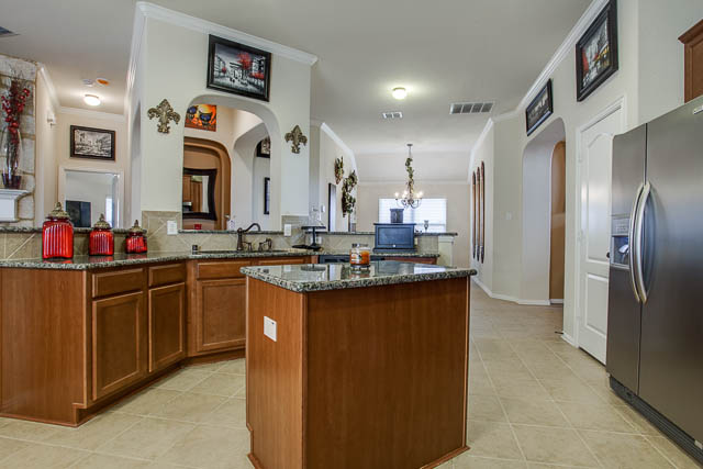 Notice the island in the kitchen and all the counter space!