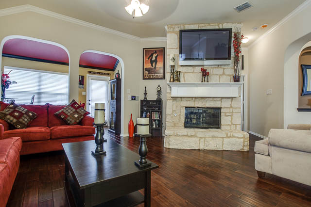 Your eyes will be drawn to the magnificent stone fireplace in the center of the room.