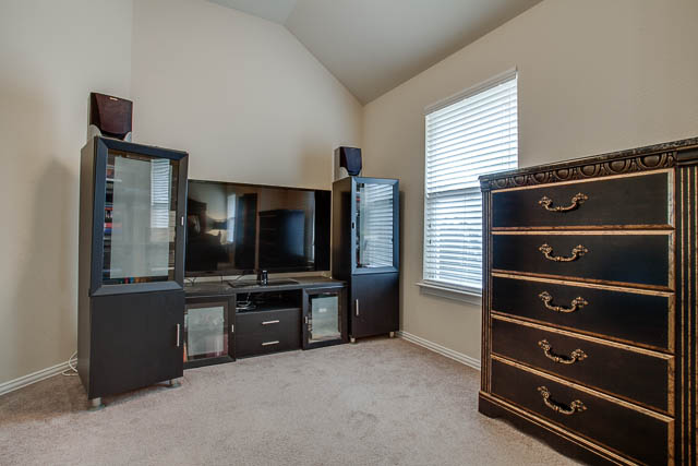 A sitting room in the master can be used for a nursery, reading nook, or even exercise space.