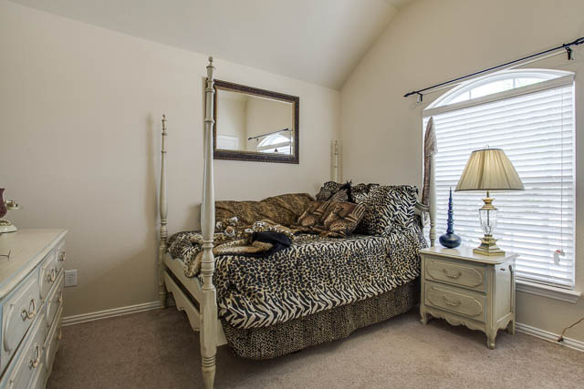 Secondary bedrooms in the home offer plenty of natural light and space.