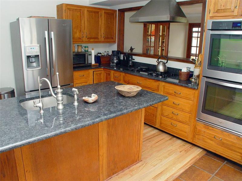 Kitchen: New granite counters. Stainless-steel dishwasher, double oven and refrigerator are new and included. 