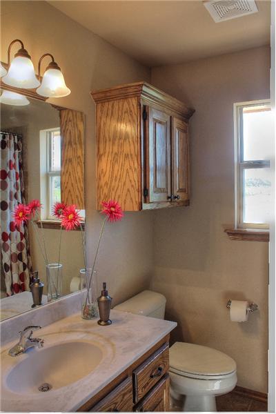 Bathroom with bathtub, fully tiled 