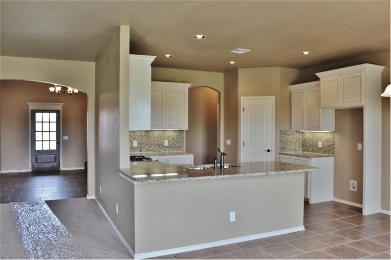 Kitchen area with granite counter tops