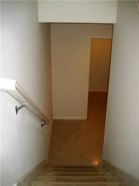 Stairs Leading Down to Laundry Room & Garage