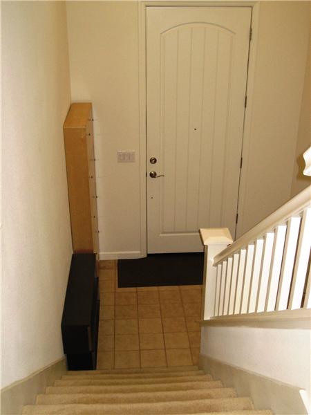 Stairs Leading Down to Front Entry Door