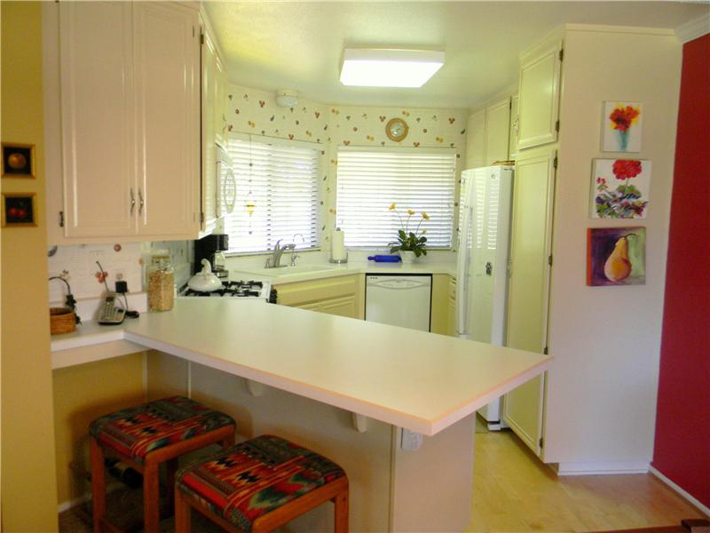 Bright kitchen with wood floor