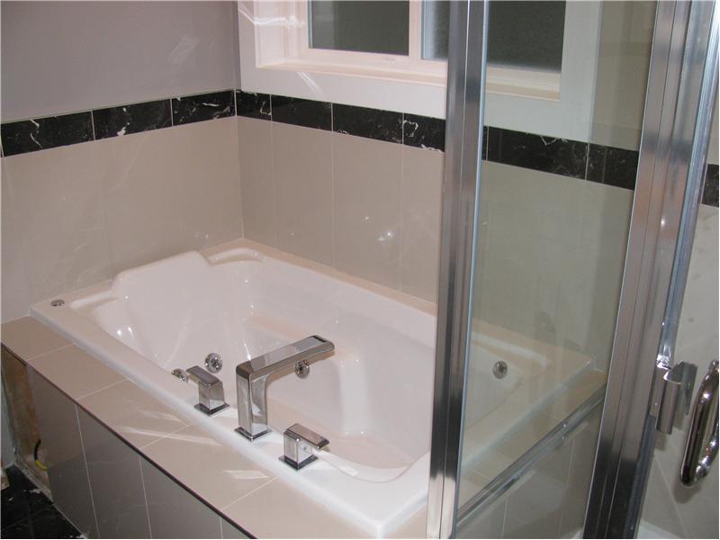 Master Bedroom with jetted soaker tub