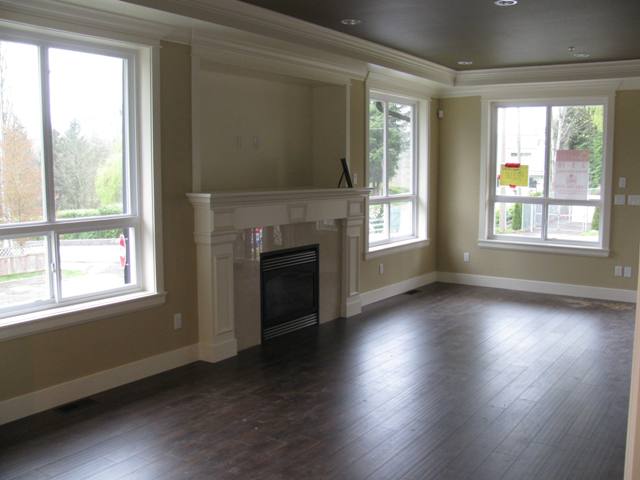 Great room or Family room with gas fireplace with plenty of windows and room for a flat screen TV