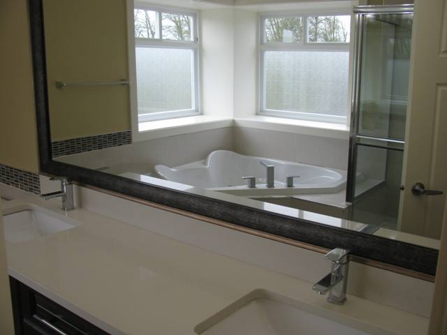 Master bedroom bathroom with two sinks and quartz counter top