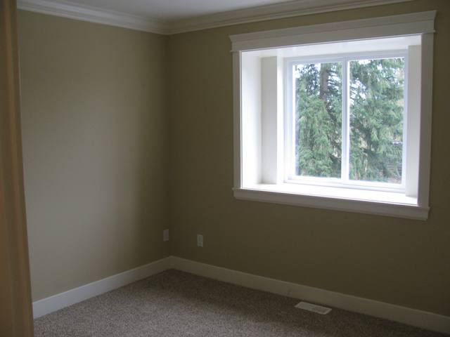 2nd bedroom with crown and baseboards