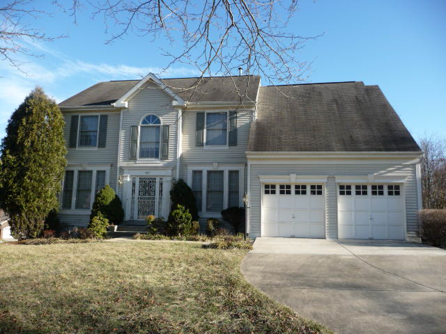 Front View of home showing 2 car garage