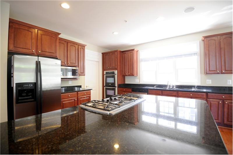 Beautiful granite countertops and Stainless Steel Appliances