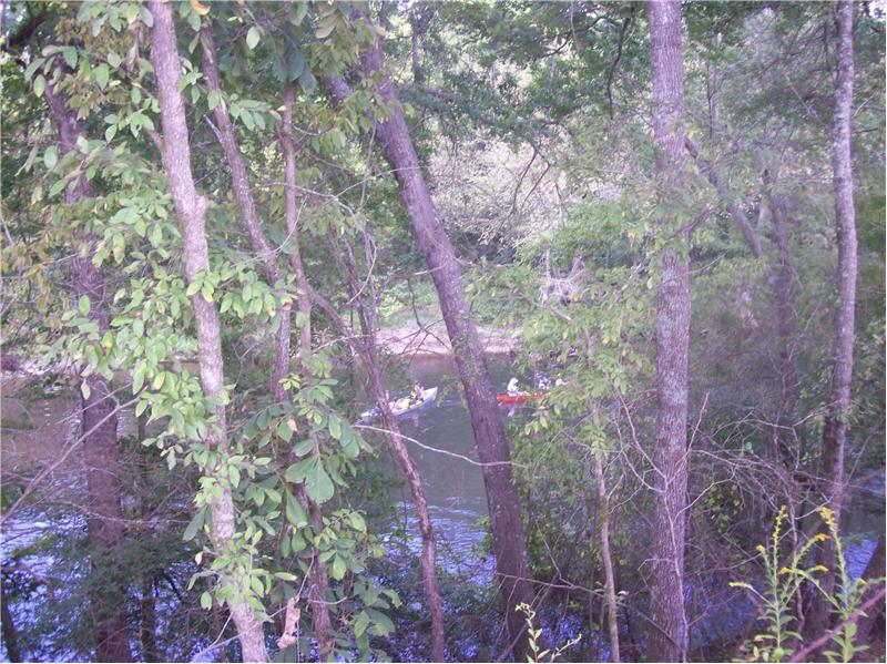 Canoers below in River
